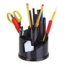 Black desk organizer with stationery and office supplies including pens, pencils, scissors, ruler, and writing tools