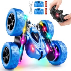 A blue remote control stunt car with glowing LED lights, shown with its remote control, batteries, and charging cable.